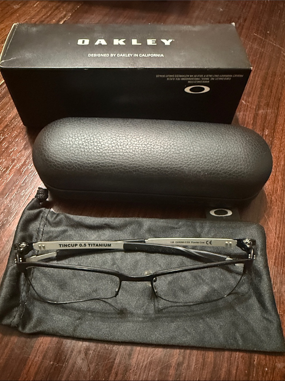 Oakley Tincup 0.5 Titanium Men's Rimless Glasses — Black